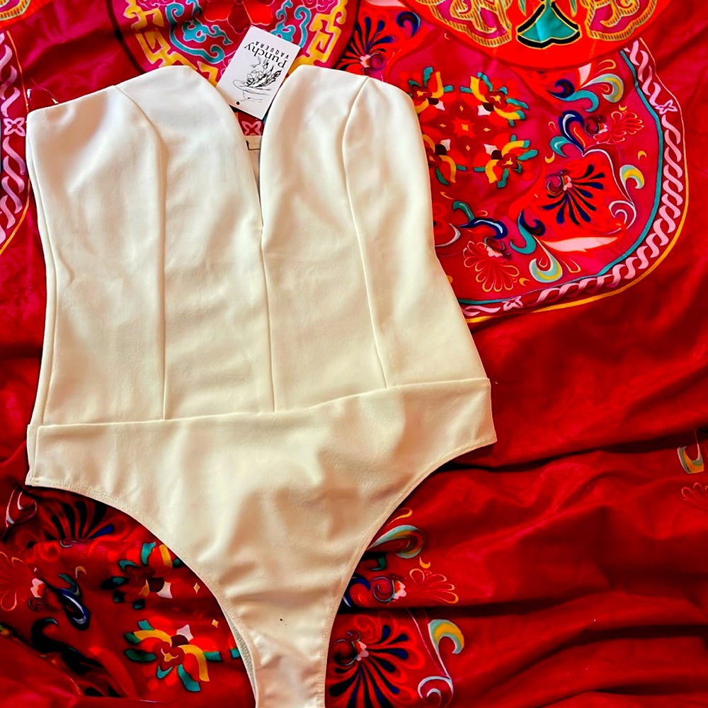 Punchy Vaquero-The Ben Bodysuit in white new with tag size Large